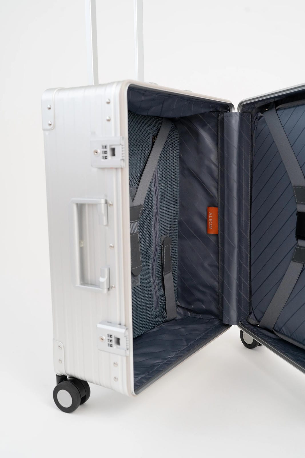 Open suitcase with interior view on a white background