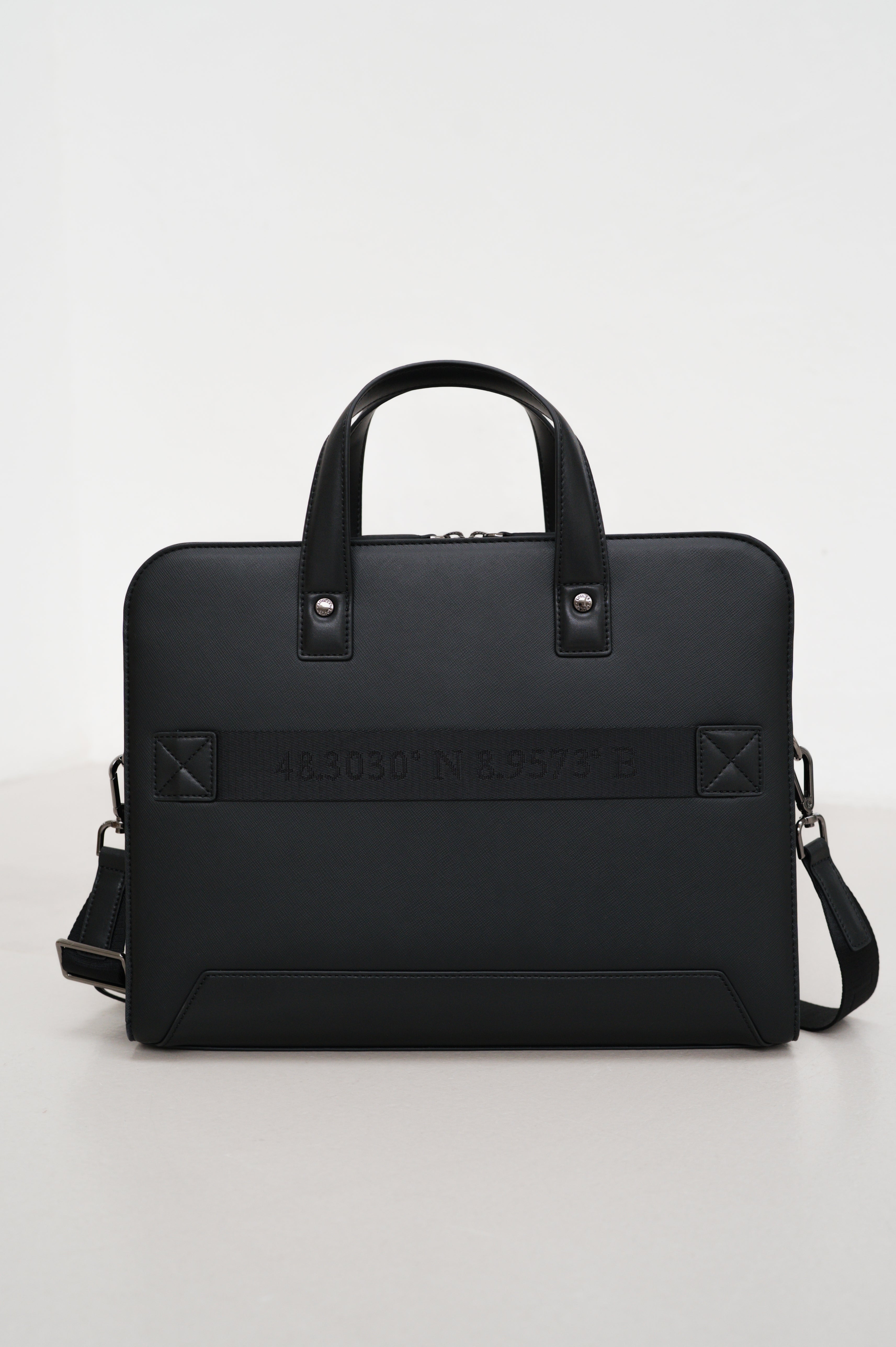 Black briefcase with a strap on a white background